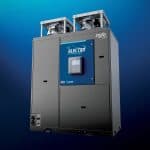 a large grey machine with two large cylinders