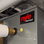 Nyle thermal water heating system with piping and control panel.